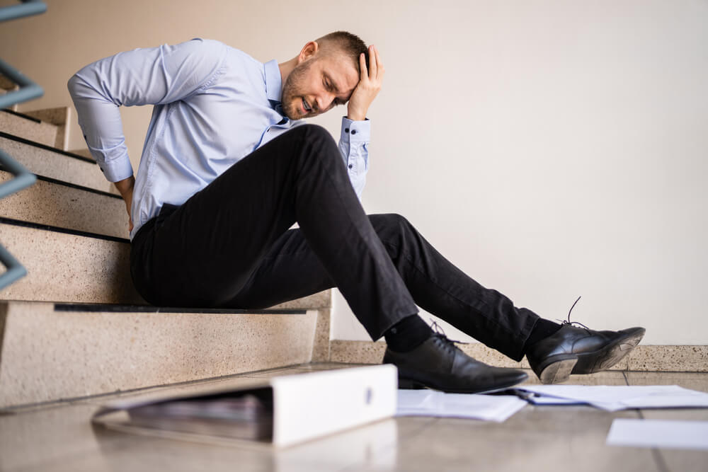 Sales agent slip and fall from the stairs suffering back pain.